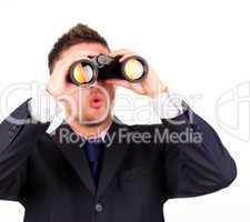 man looking through binoculars surprise