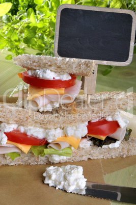 Sandwich mit Preistafel
