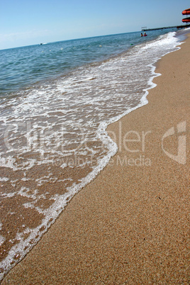 Sandy coast of lake.