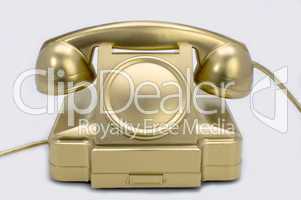 The gold telephone.