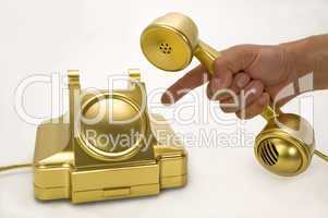The gold telephone.