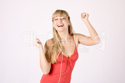 young blond woman with mp3-player