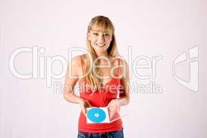 young blonde woman offers a neutral media-disc