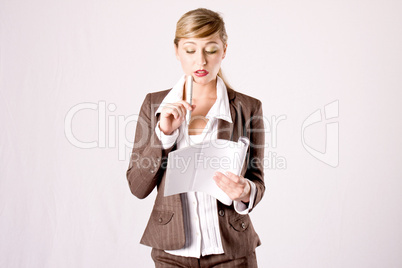 young business woman with business papers