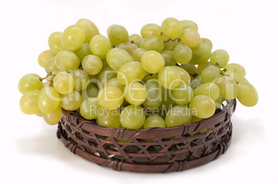 Green grapes in basket.