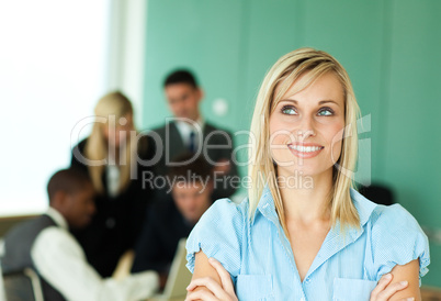 Businesswoman with people at work