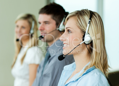 Businesspeople working with headsets