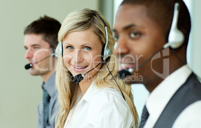 Businesspeople wearing headsets
