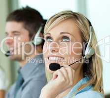 Two businesspeople with headsets