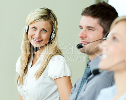 Businesspeople working with headsets