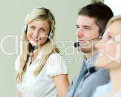 Businesspeople working with headsets