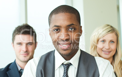 Portrait of an Afro-American businessman with his colleagues