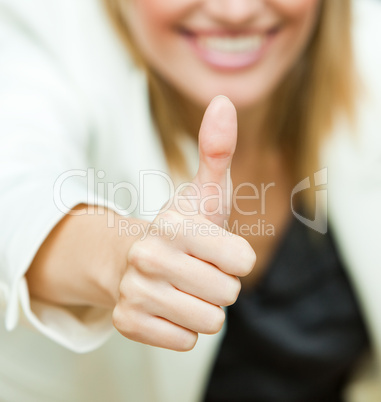 Businesswoman with her thumbs up