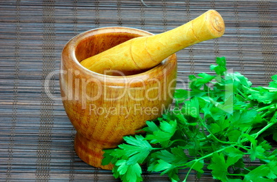 wooden mortar and herbs