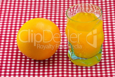 glass of orange juice and fruit