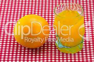 glass of orange juice and fruit