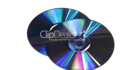 CD DVD rotating on white