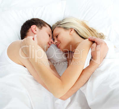 Boyfriend and girlfriend sleeping in bed