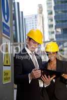 Male and Female Construction Site Managers Having A Meeting