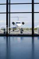 Private Corporate Jet at An AIrport Terminal
