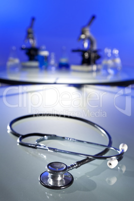 Stethescope and Microscopes In Medical Research Laboratory