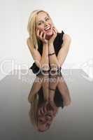 Beautiful Laughing Blond Girl And Her Reflection