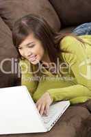 Happy Young Asian Chinese Woman Using Laptop Computer