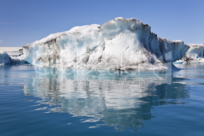 Iceberg and Reflection on the Lagoon, Jokulsarlon, Iceland