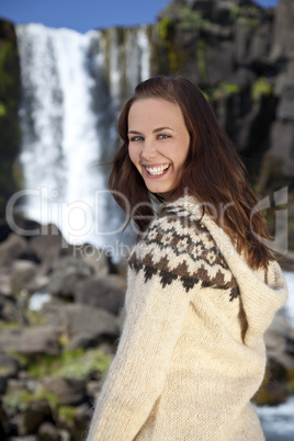 Beautiful Scandinavian Woman By A Waterfall