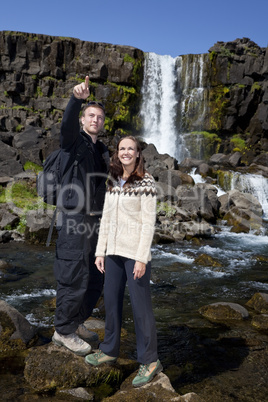 Romantic Couple By a Waterfall
