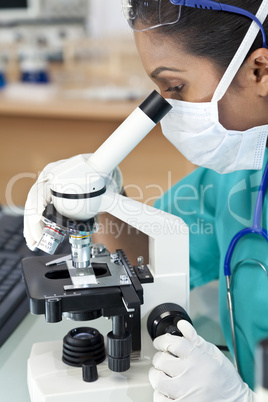 Woman Doctor and Microscope In Labor