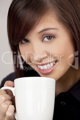 Woman Drinking Coffee or Tea
