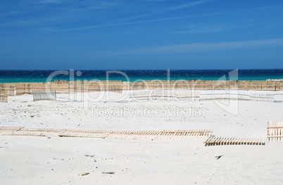 Gusty beaches with sand-fences and deep blue sky, Tarifa