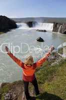 Woman At Godafoss Waterfall