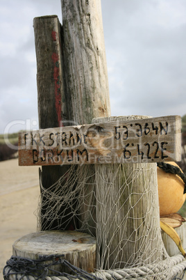 Hinweisschild am Strand
