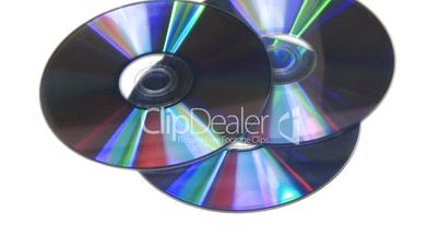 Blue CD DVD rotating on white background