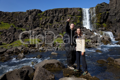 Romantic Couple By a Waterfall
