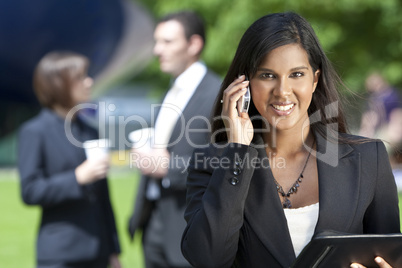 Asian Businesswoman On Her Cell Phone