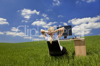 Woman Relaxing In a Green Office