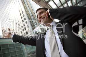 Businessman On His Cell In The City