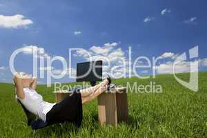 Woman Relaxing In a Green Office