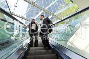 Executives on an Escalator