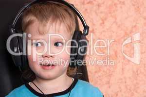 child in ear-phones
