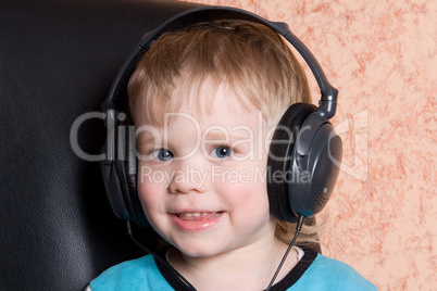 child in ear-phones