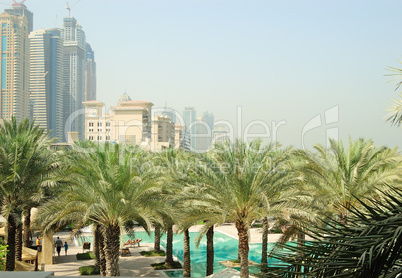 Swimming pool recreation area in luxurious hotel, Dubai, UAE