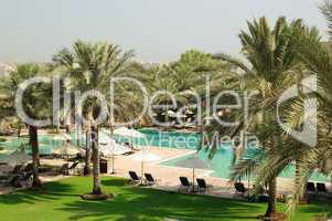 Swimming pool recreation area in luxurious hotel, Dubai, UAE
