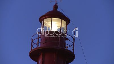 Lighthouse lighted by night