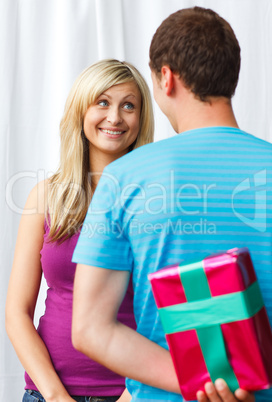 Man giving a present to a woman