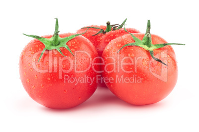 Tomato with green leaf and drops