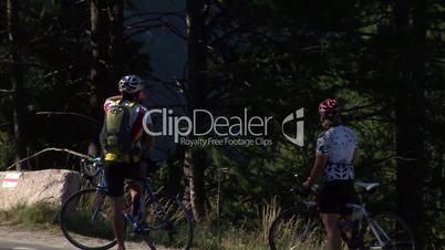 Mountainbikers in Front Of Glacier